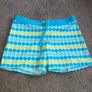 teal swimming trunks